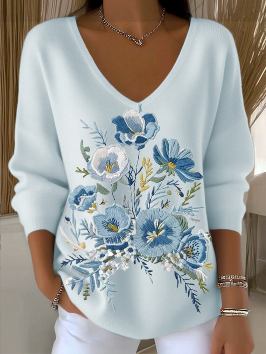 Női kék virágos hímzett v-nyak pulóver