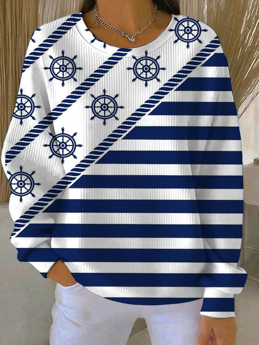 Női tengeri stílusú fehér és kék csíkos pulóver hajókerék mintákkal